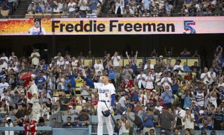 Emotional Freddie Freeman gets hug from Bryce Harper